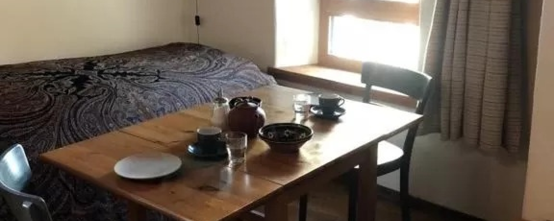 La camera da letto funge anche da salotto